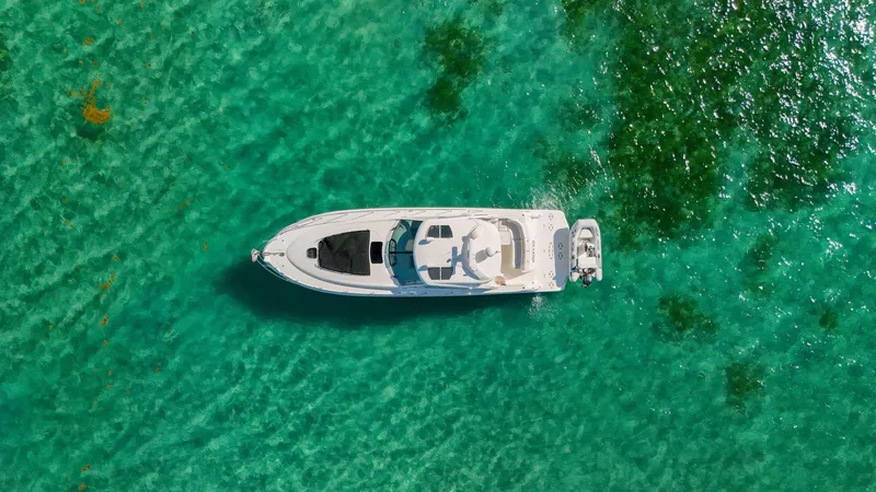 Slide: The Image of Aerial view of 2008 Sea Ray 48 Sundancer yacht on clear turquoise water. - 4