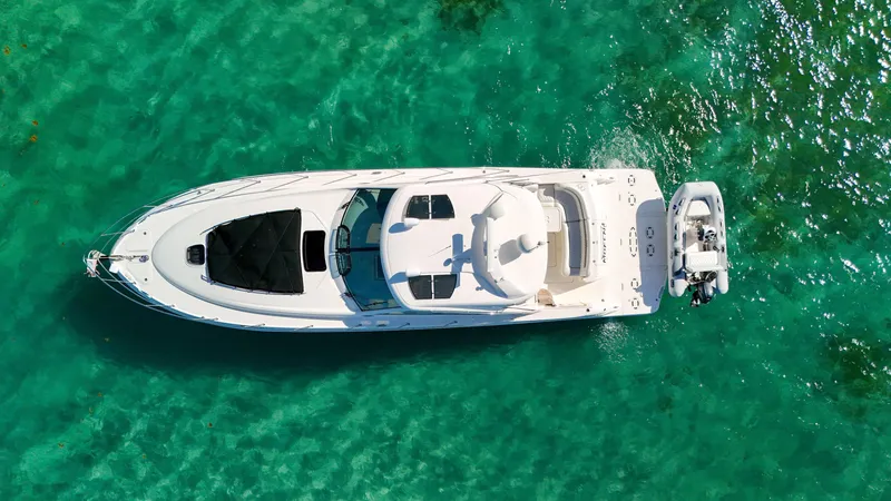 Slide: The Image of Aerial view of 2008 Sea Ray 48 Sundancer yacht on turquoise water. - 5