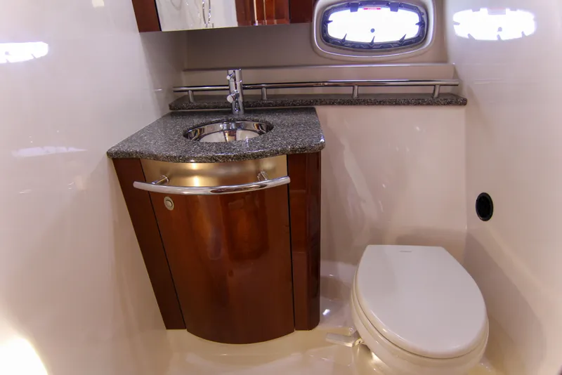 Slide: The Image of Luxurious bathroom in 2008 Sea Ray 48 Sundancer yacht with modern fixtures and wood cabinetry. - 8