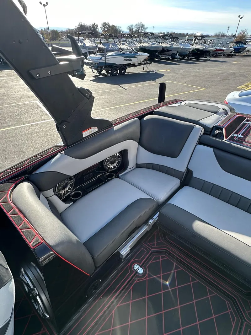 Slide: The Image of Interior of 2022 MB Tomcat F22 Alpha boat with stylish seating and speakers. - 13