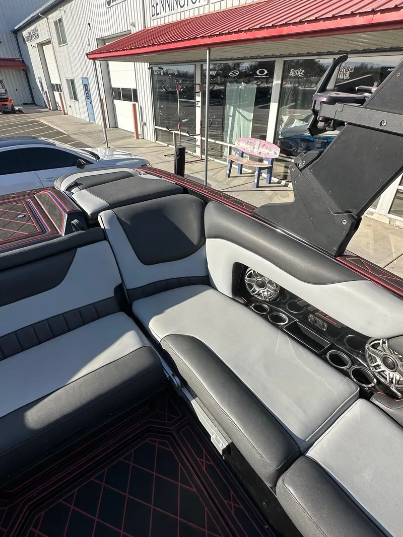 Slide: The Image of Interior of 2022 MB Tomcat F22 Alpha boat with gray and black seating. - 14