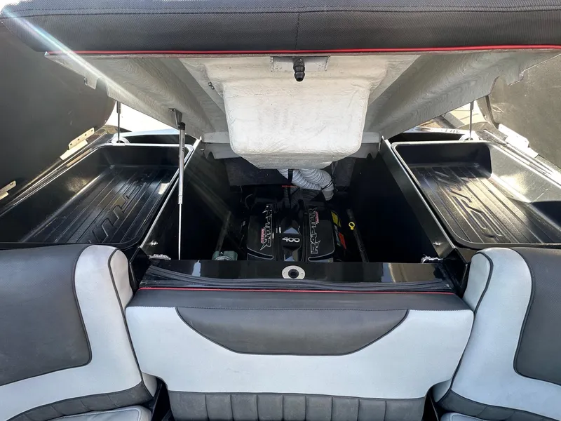 Slide: The Image of Open engine compartment of 2022 MB Tomcat F22 Alpha boat, showcasing Raptor 400 engine. - 19