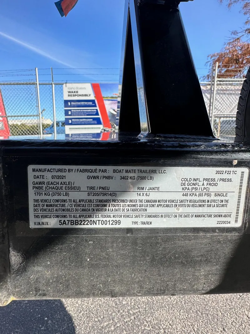 Slide: The Image of Label on MB Tomcat F22 Alpha trailer, 2022 model, showing specifications and compliance details. - 22