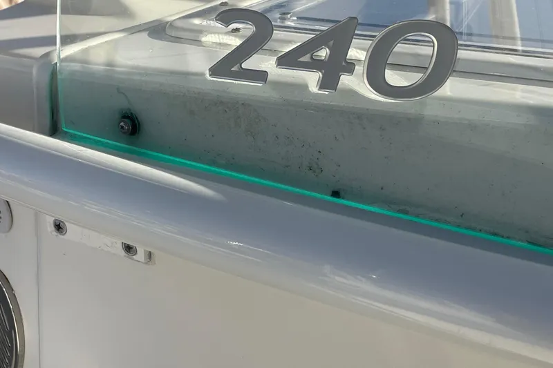 Slide: The Image of Sailfish 240 boat, 2015 model, close-up of the number "240" on the deck. - 12