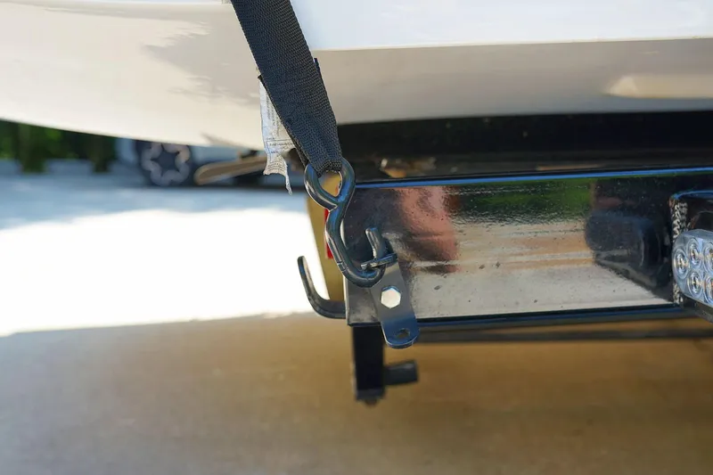 Slide: The Image of Close-up of a 2014 Tigé R20 boat trailer hook and strap. - 20
