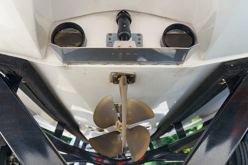 Slide: The Image of 2014 Tigé R20 boat propeller and hull underside view. - 25