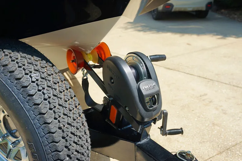 Slide: The Image of 2014 Tigé R20 boat trailer with Fulton winch and tire detail. - 32