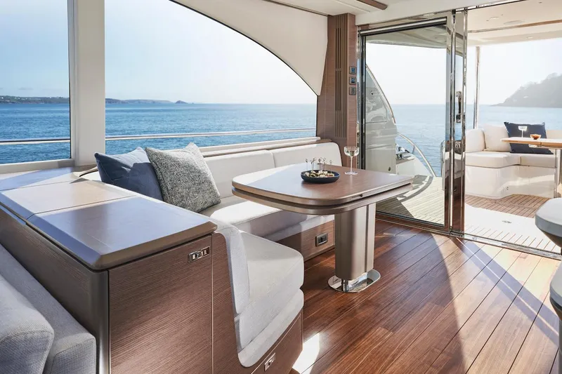 Slide: The Image of Luxurious interior of 2025 Princess Y72 Motor Yacht with modern kitchen and ocean view. - 21