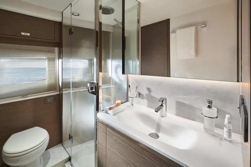 Slide: The Image of Luxurious bathroom in 2025 Princess Y72 Motor Yacht with modern fixtures and elegant design. - 28