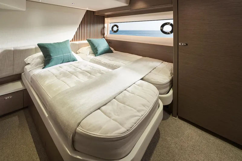 Slide: The Image of Luxurious twin bedroom in 2025 Princess Y72 Motor Yacht with ocean view. - 31