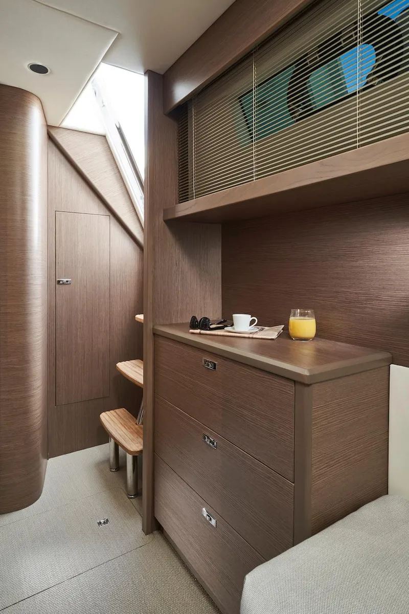 Slide: The Image of Luxurious interior of 2025 Princess Y72 Motor Yacht with modern wood finish. - 38