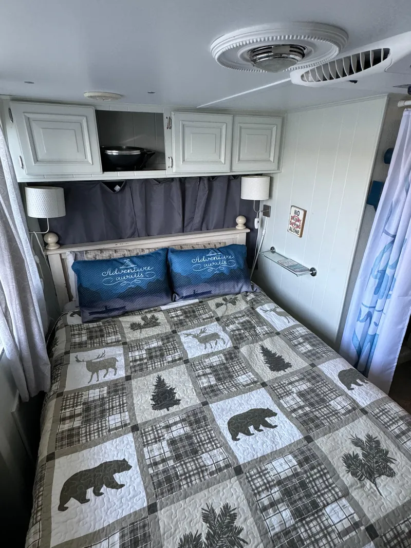 Slide: The Image of Cozy bedroom in 1979 Nauta-Line Nautaline boat with nature-themed bedding and decor. - 11