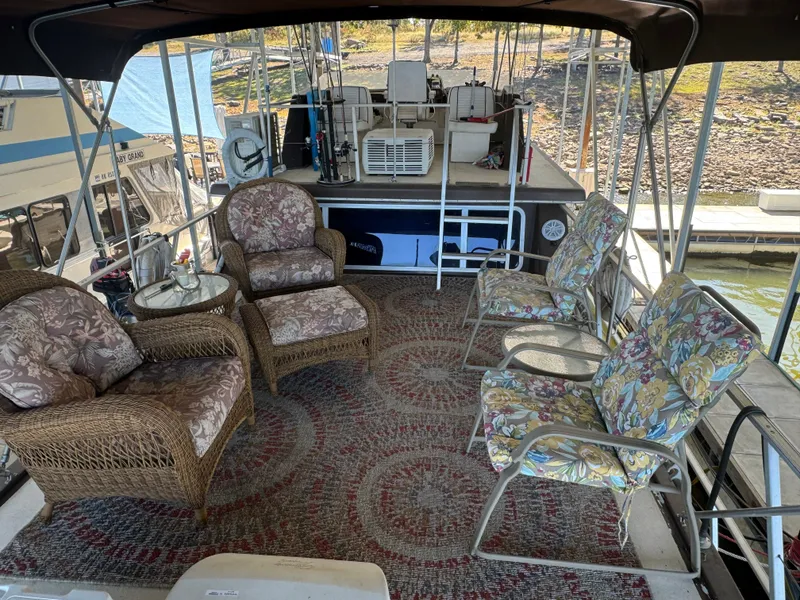 Slide: The Image of 1979 Nauta-Line Nautaline boat deck with wicker chairs and floral cushions. - 20