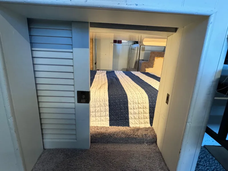 Slide: The Image of Interior of 1979 Nauta-Line Nautaline with striped bedding and sliding door. - 4