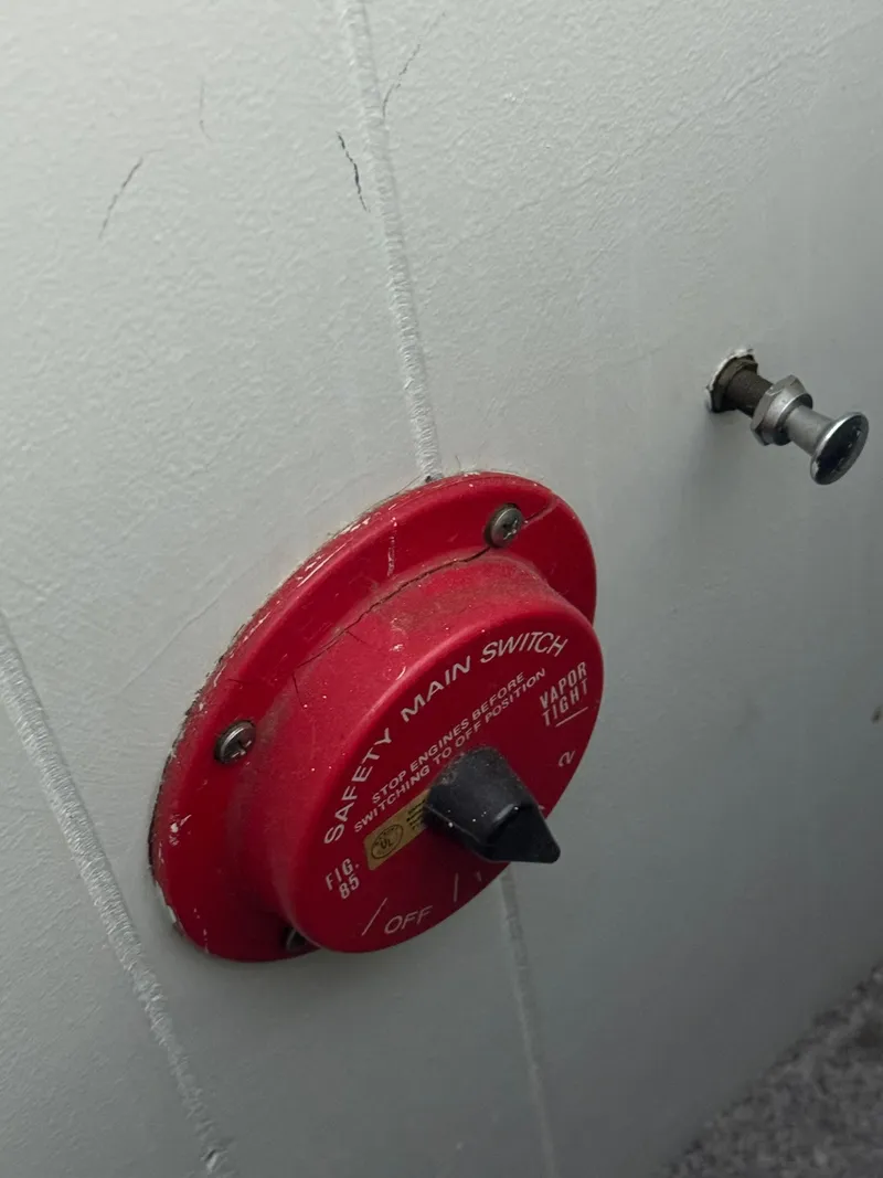 Slide: The Image of Red safety main switch on 1979 Nauta-Line Nautaline boat interior wall. - 8