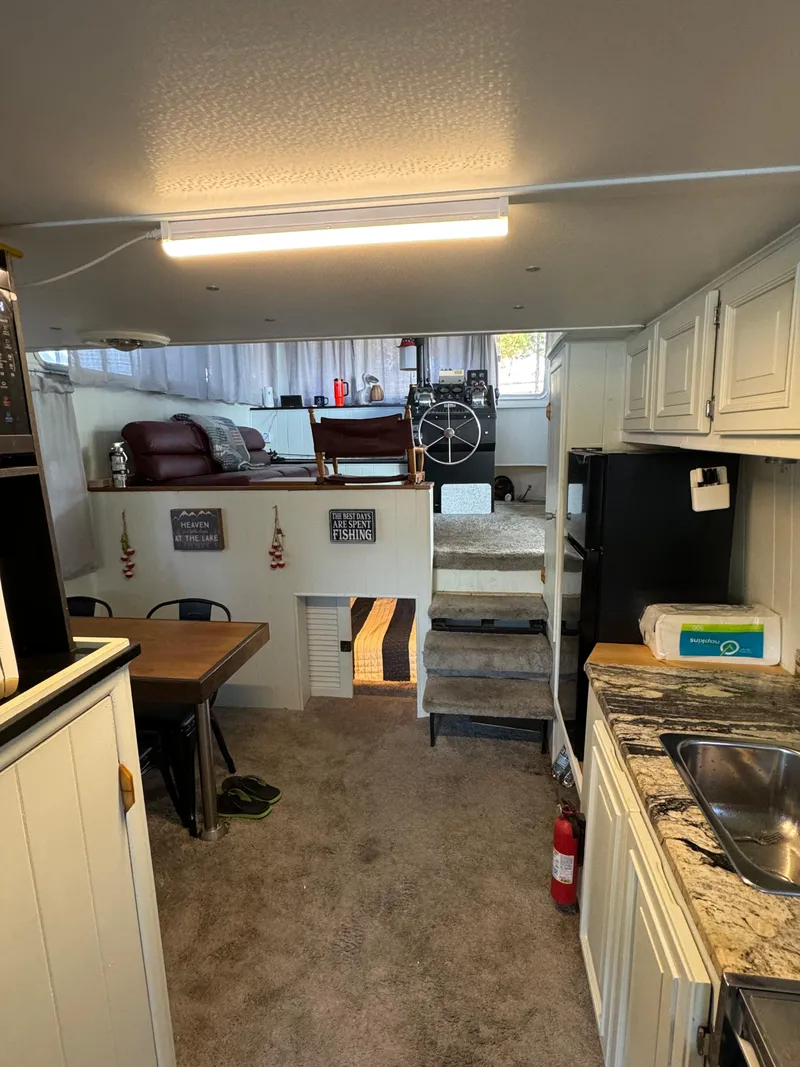 Slide: The Image of Interior of a 1979 Nauta-Line Nautaline boat with kitchen and seating area. - 9