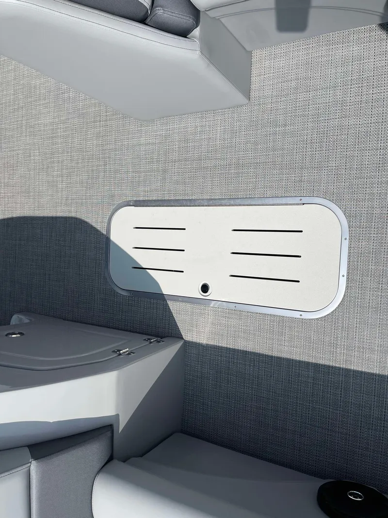 Slide: The Image of 2025 Bentley Pontoons Legacy 243 Swingback interior detail with sleek, modern design. - 11