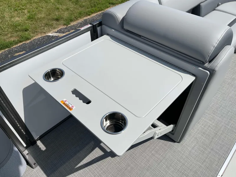 Slide: The Image of 2025 Bentley Pontoons Legacy 243 Swingback with foldable table and cup holders. - 13