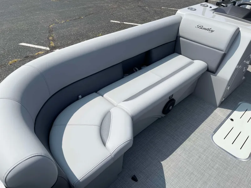 Slide: The Image of 2025 Bentley Pontoons Legacy 243 Swingback with sleek gray seating and modern design. - 9