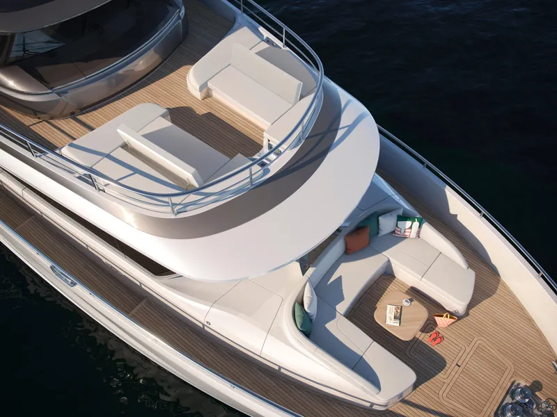 Slide: The Image of Luxurious 2025 Princess X80 yacht deck with elegant seating and modern design. - 3