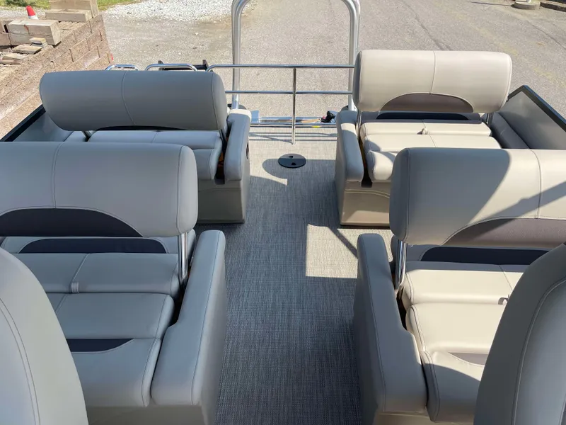 Slide: The Image of 2025 Bentley Pontoons Legacy 223 QSB interior with plush seating and spacious layout. - 21