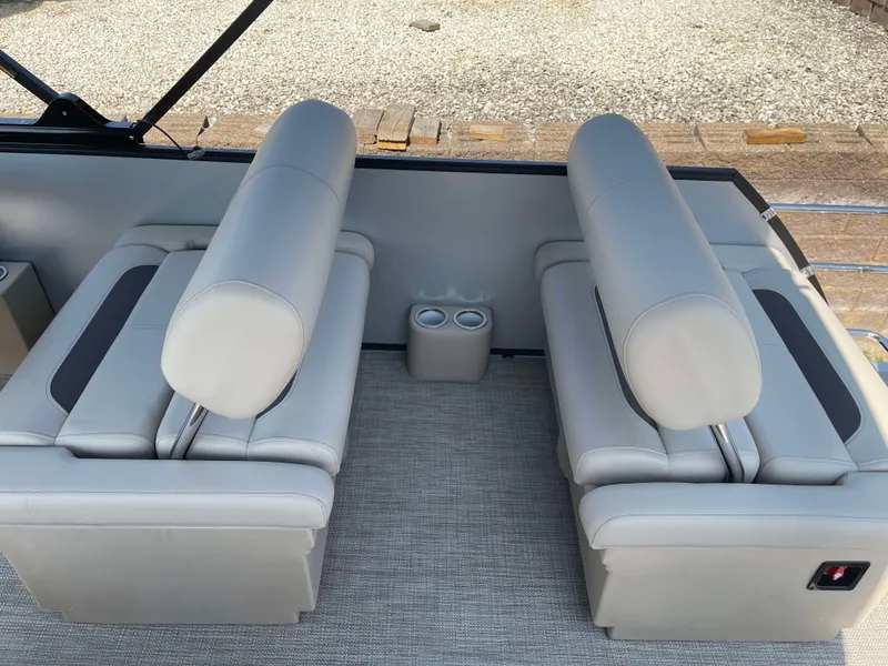Slide: The Image of 2025 Bentley Pontoons Legacy 223 QSB interior seating with cup holders. - 23