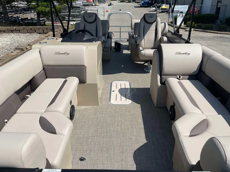 Slide: The Image of 2025 Bentley Pontoons Legacy 223 QSB interior with luxurious seating and spacious layout. - 7