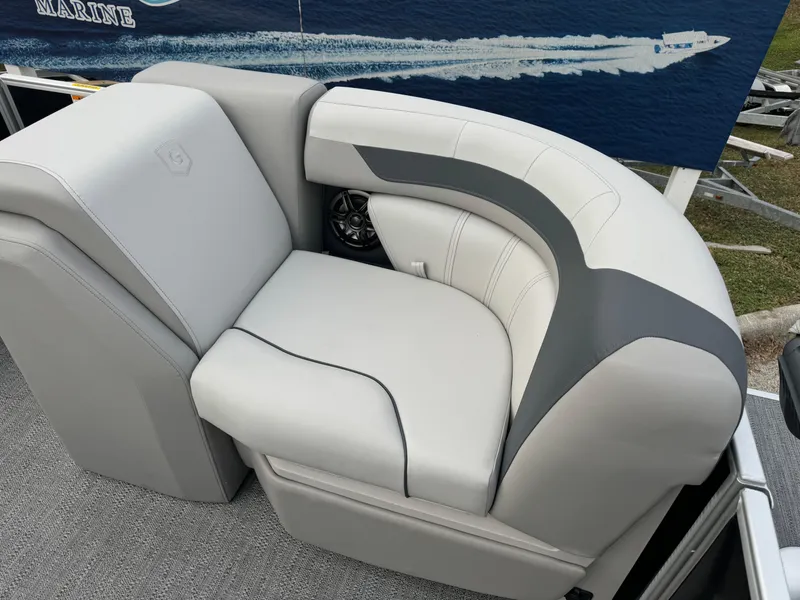 Slide: The Image of Luxurious seating on 2025 Sweetwater 2086 BF boat, featuring sleek gray upholstery. - 4