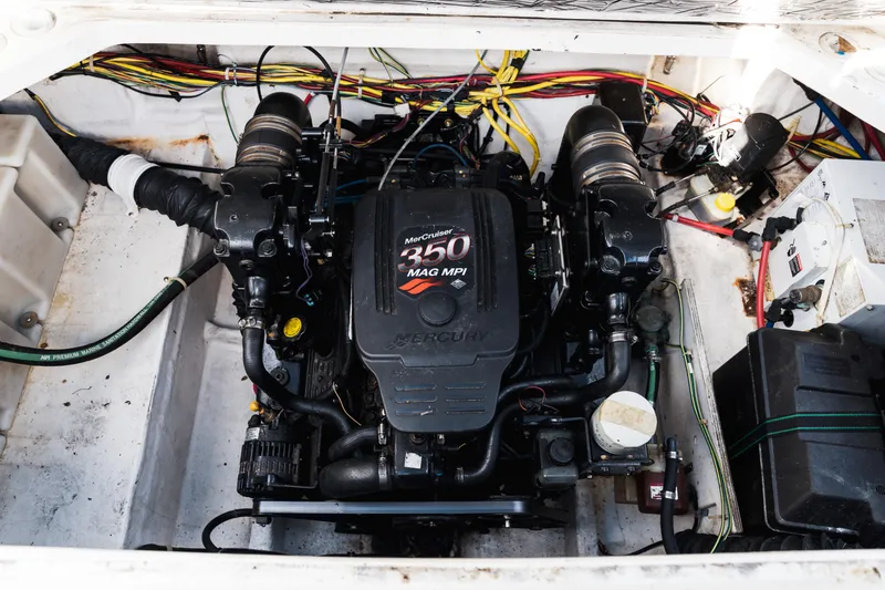Slide: The Image of 2005 Bayliner 285 engine compartment with MerCruiser 350 MAG MPI engine. - 11
