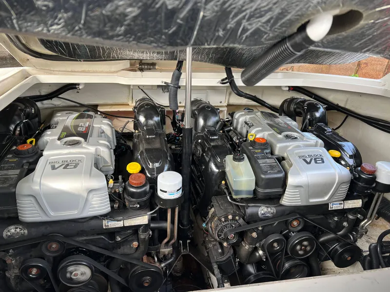 Slide: The Image of 2016 Sea Ray 350 SLX boat engines, featuring dual V8 motors. - 16