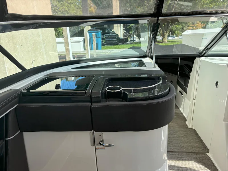 Slide: The Image of 2016 Sea Ray 350 SLX boat interior with sleek design and modern amenities. - 9