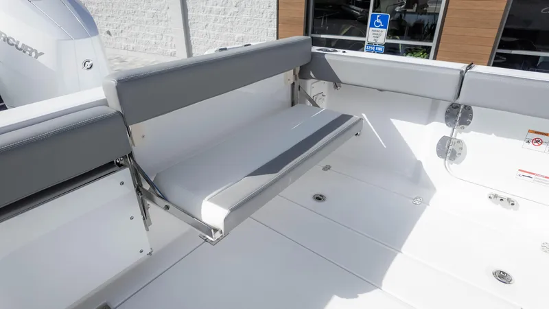 Slide: The Image of 2025 Everglades 315 Center Console boat with foldable seating and modern design. - 13