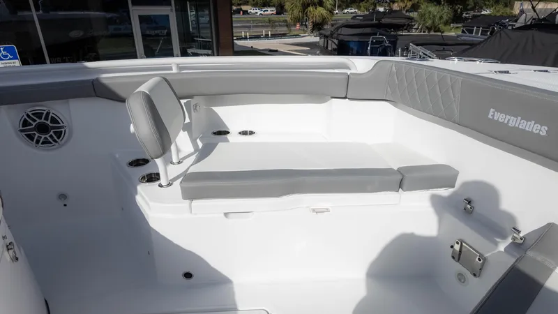 Slide: The Image of 2025 Everglades 315 Center Console boat interior with seating and speaker. - 29