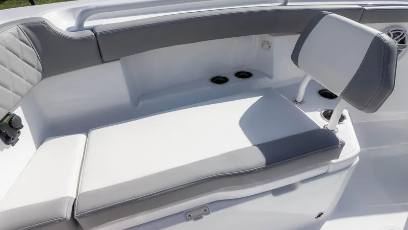 Slide: The Image of 2025 Everglades 315 Center Console boat seating area with gray and white upholstery. - 30