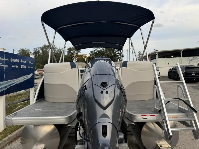 Slide: The Image of 2025 Sweetwater 2286 SB pontoon boat with outboard motor and canopy. - 12