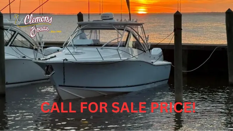 The Image of 2025 Albemarle 30 Express boat docked at sunset, Clemons Boats logo, call for sale price. - 0