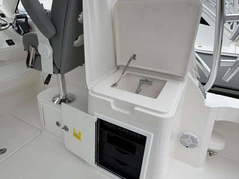 Slide: The Image of 2025 Albemarle 30 Express boat interior with sink and seating area. - 15