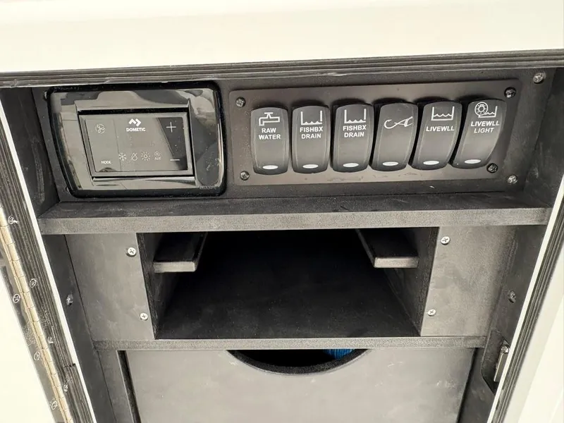 Slide: The Image of Control panel of 2025 Albemarle 30 Express boat with labeled switches. - 16