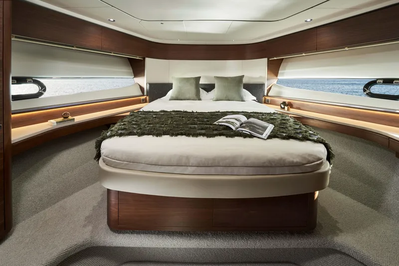 Slide: The Image of Luxurious 2025 Princess F65 yacht bedroom with elegant design and ocean view. - 5