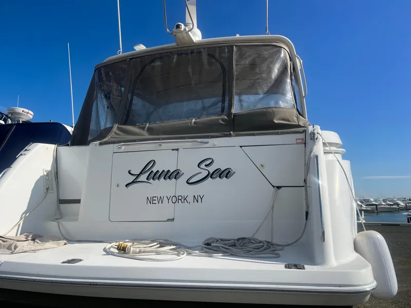 Slide: The Image of 1998 Formula 41PC yacht "Luna Sea" docked in New York marina. - 14