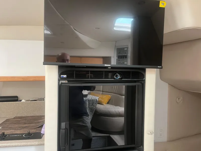 Slide: The Image of Interior of 1998 Formula 41PC yacht with TV and built-in appliance. - 6