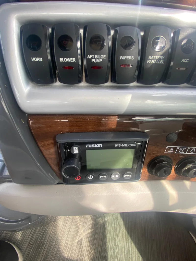 Slide: The Image of Dashboard of a 2018 Four Winns 355 Vista with Fusion MS-NRX300. - 12