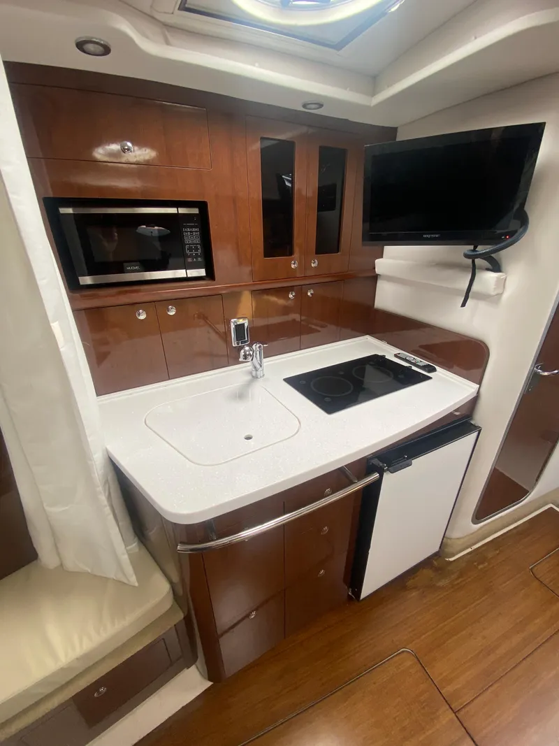 Slide: The Image of Galley in a 2018 Four Winns 355 Vista yacht. - 15