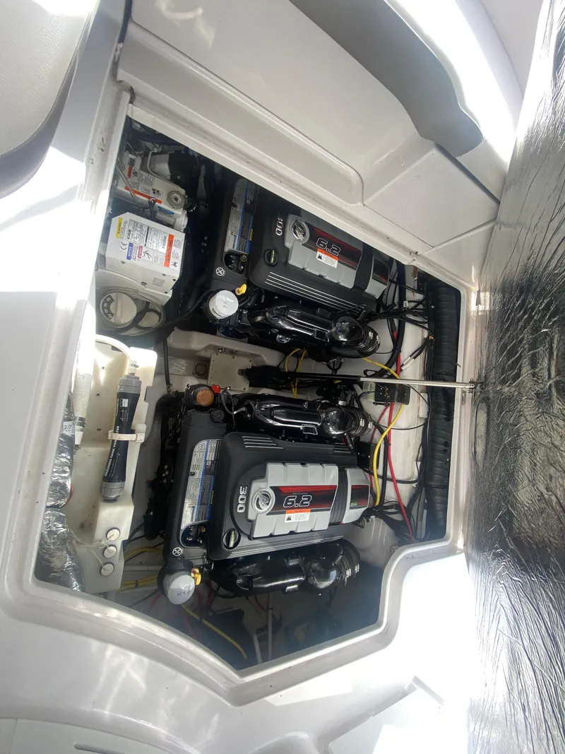 Slide: The Image of Engine compartment of 2018 Four Winns 355 Vista with dual engines. - 23