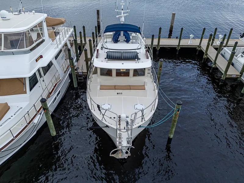 Slide: The Image of 2004 Kadey-Krogen Krogen North Sea yacht docked at marina, aerial view. - 3