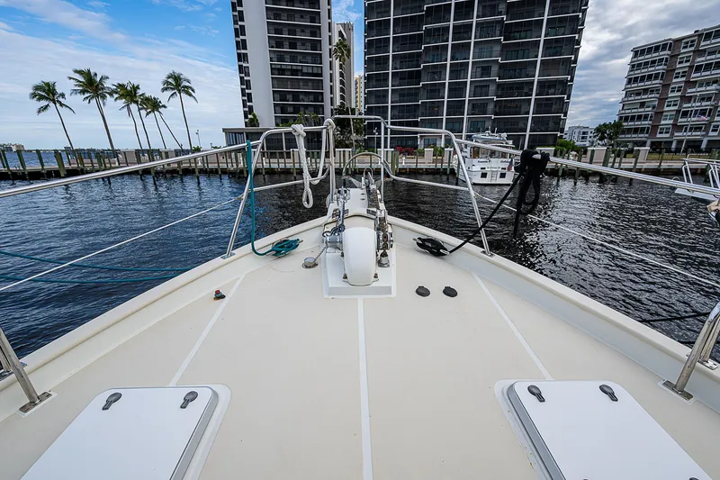 Slide: The Image of Bow view of 2004 Kadey-Krogen Krogen North Sea yacht docked near waterfront buildings. - 38