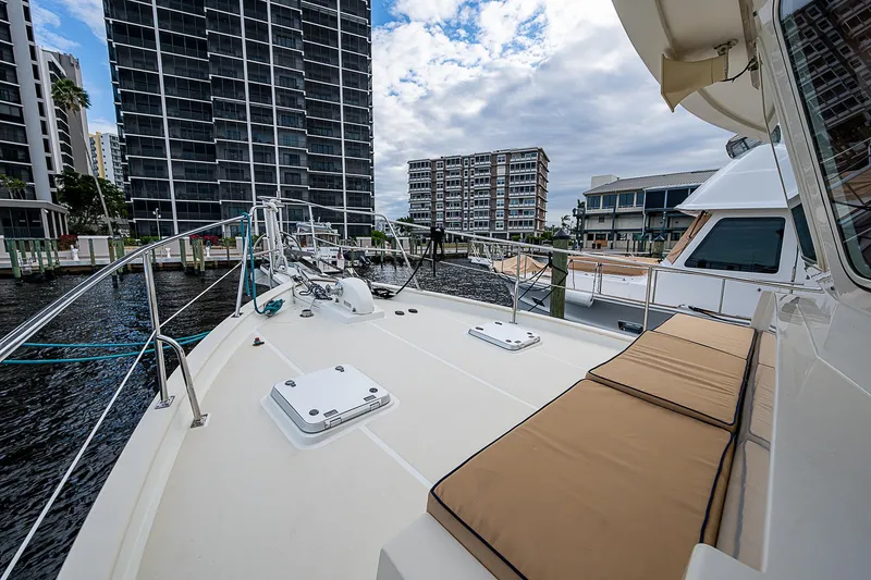 Slide: The Image of 2004 Kadey-Krogen Krogen North Sea yacht deck with urban waterfront view. - 40