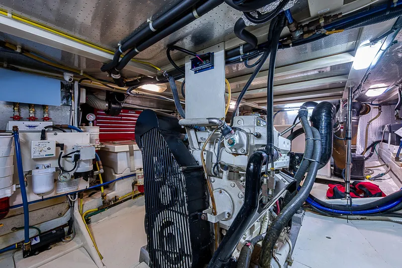 Slide: The Image of Engine room of 2004 Kadey-Krogen Krogen North Sea yacht, showcasing machinery and equipment. - 37