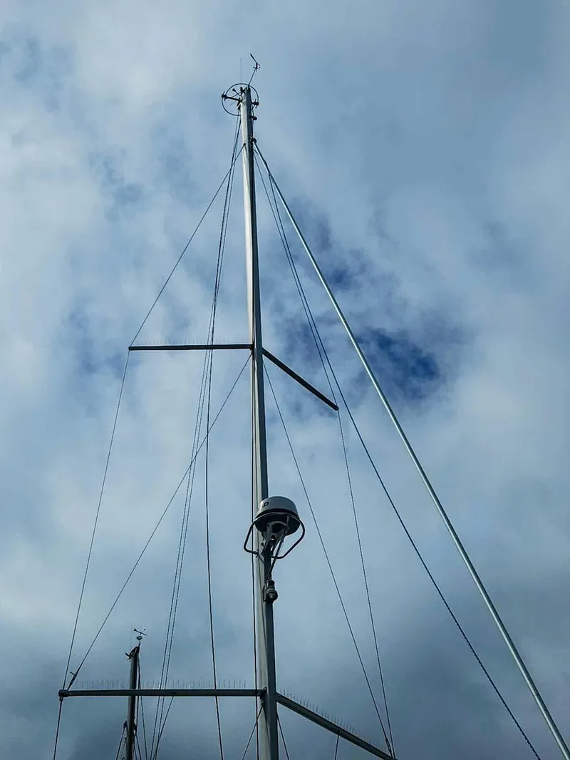 Slide: The Image of Mast of 2012 Beneteau Oceanis 41 sailboat against cloudy sky. - 12