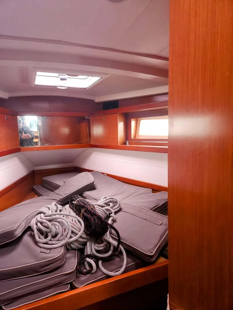 Slide: The Image of Interior of 2012 Beneteau Oceanis 41 sailboat with ropes and cushions. - 14